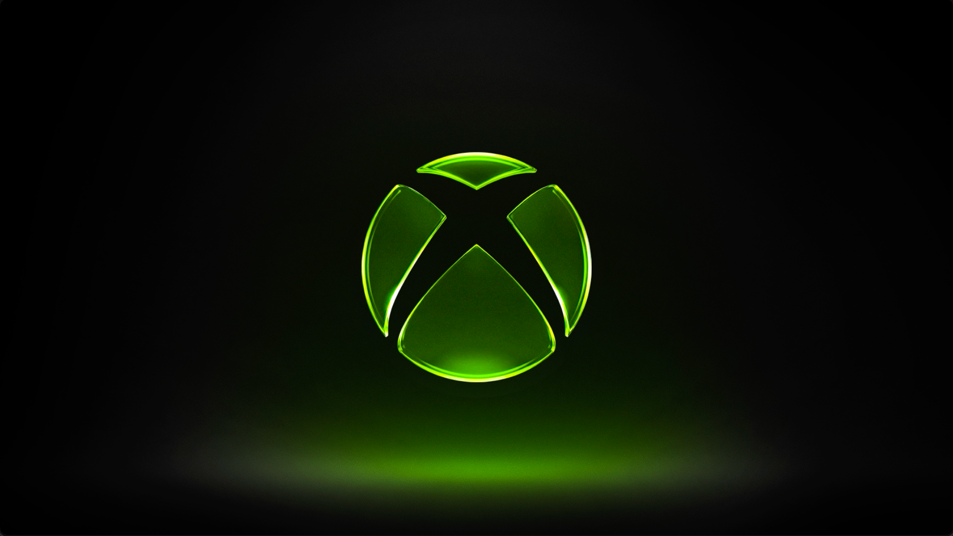 Official luminous green XBOX symbol against a dark background, from Microsoft XBOX Wire